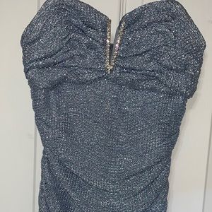 Mid-thigh sparkling ice blue cocktail dress.